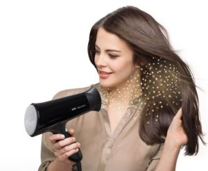 What is the ionization function in a hair dryer