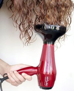 Why do you need a diffuser attachment in a hair dryer?