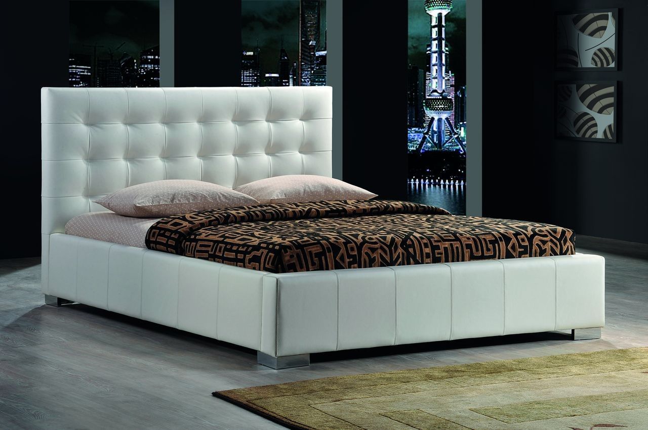 Double beds with leather headboard.