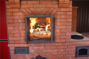 Burning wood in the stove.