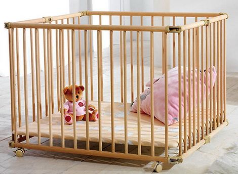 Playpen for a child.