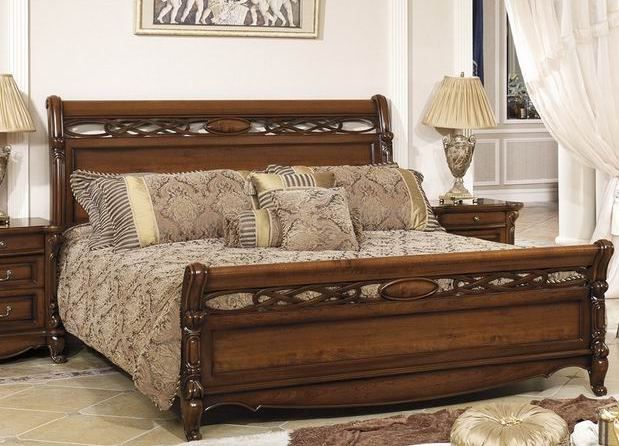 Beautiful double wooden bed.