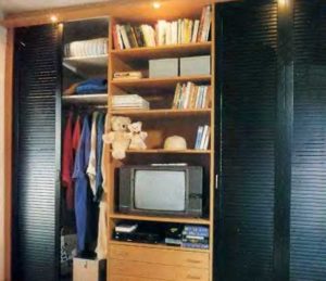 Built-in wardrobe filled with