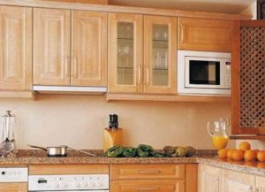 At what height should you hang kitchen cabinets?