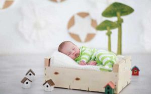 newborn on a pillow