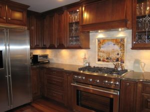 The color of the walls in the kitchen with brown furniture