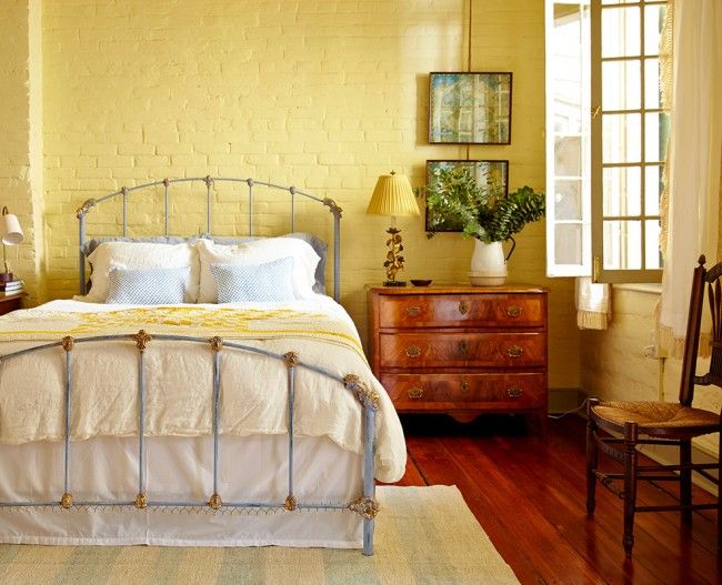 Bedroom design with wrought iron bed