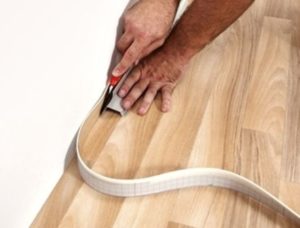 How to lay linoleum on a concrete floor