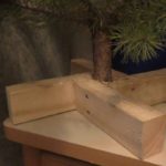 DIY Christmas tree stand made of wood.