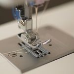 how to insert thread into a sewing machine