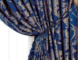 Blue curtains in the bedroom interior.