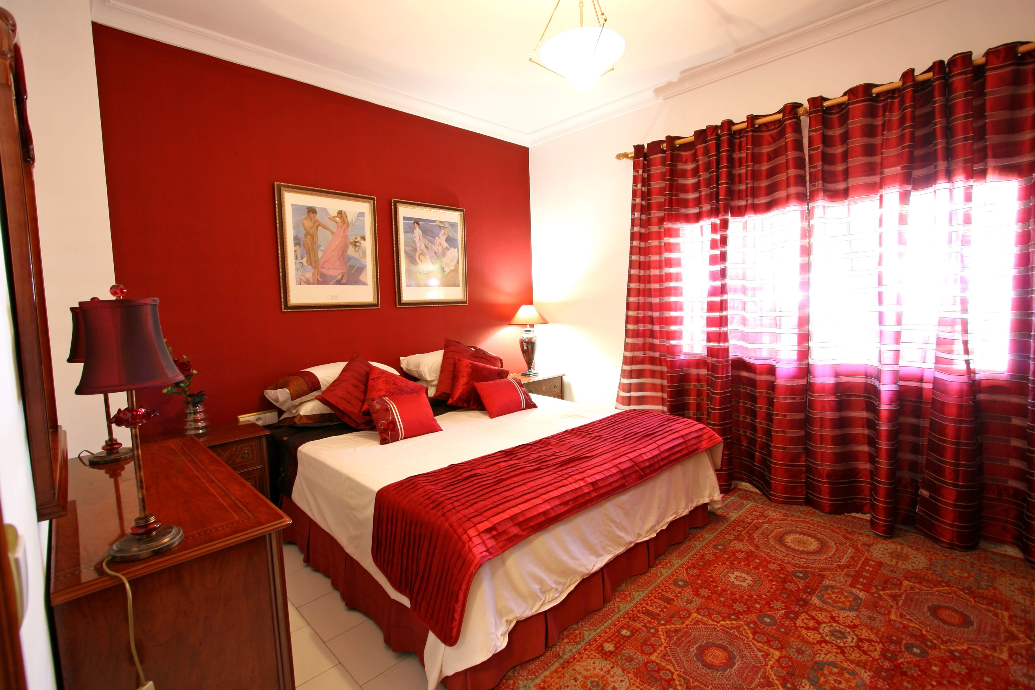 Red curtains in the bedroom