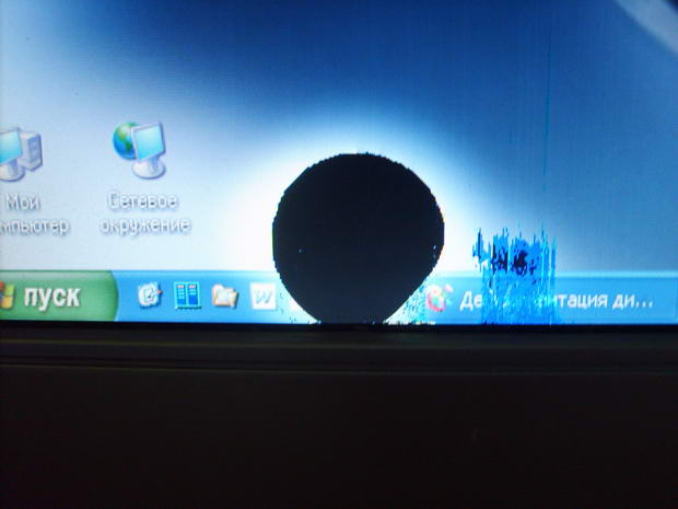 A black spot appears on the monitor.