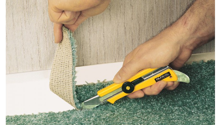 Trimming carpet at home.