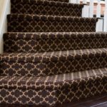 Staircase with carpet.