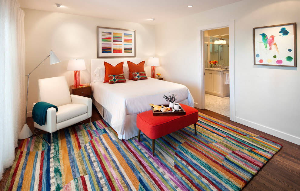 Multi-colored carpet in the bedroom interior.