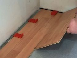 How to lay laminate along or across a room