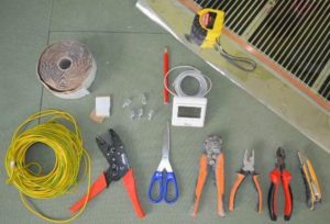 Preparation of materials and tools for installation of film flooring