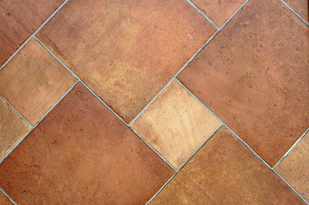 Laying tiles in a herringbone pattern 