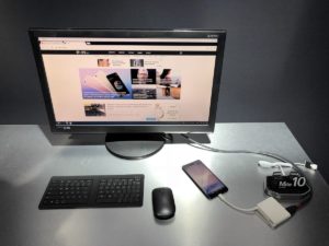 Smartphone connected to computer monitor