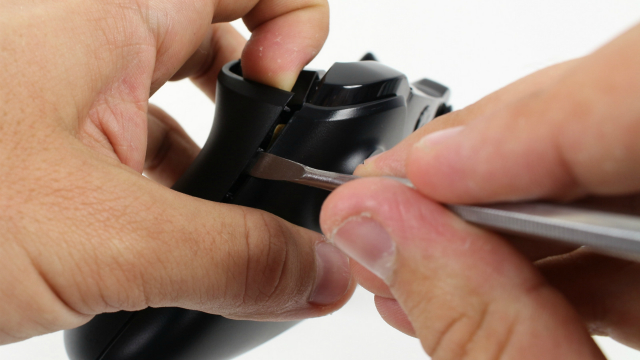 Removing the sides of the gamepad.