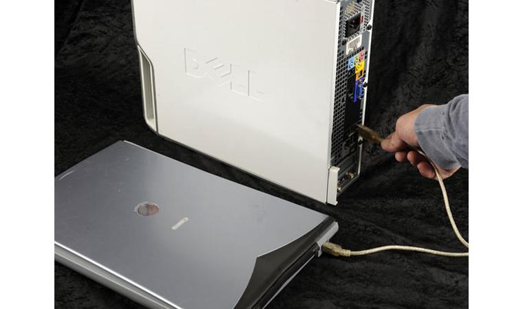 Connecting the scanner using a USB cable.