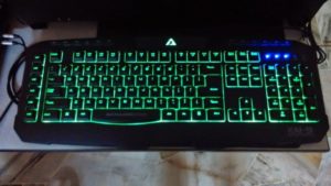 como desligar a luz de fundo do teclado