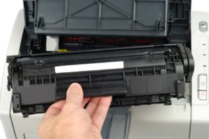 Een cartridge in een printer vervangen