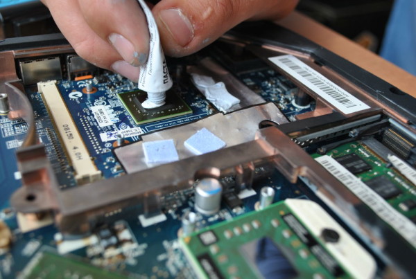 Applying thermal paste.