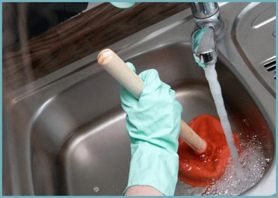 Mechanical method of cleaning the sink.