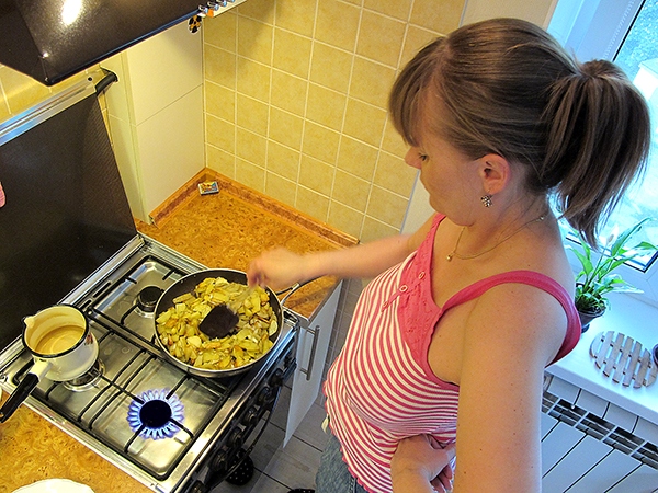 Cooking on a stove lined with foil.