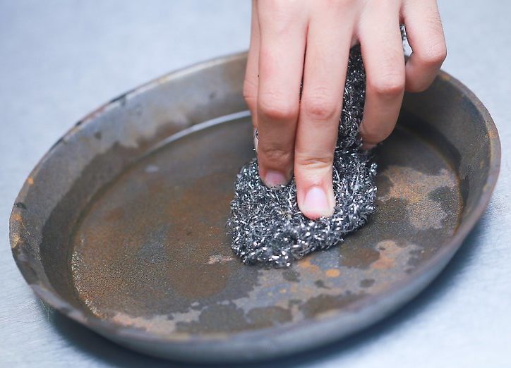 Washing cast iron cookware.