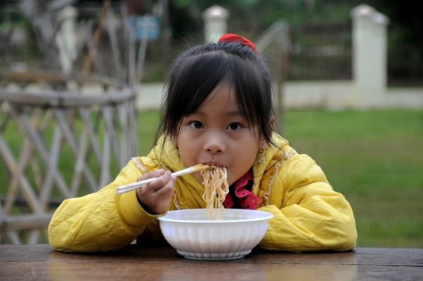 Why do Asians eat with sticks?