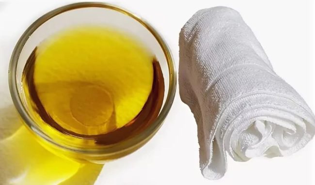 Vegetable oil with a towel - tandem against dirt