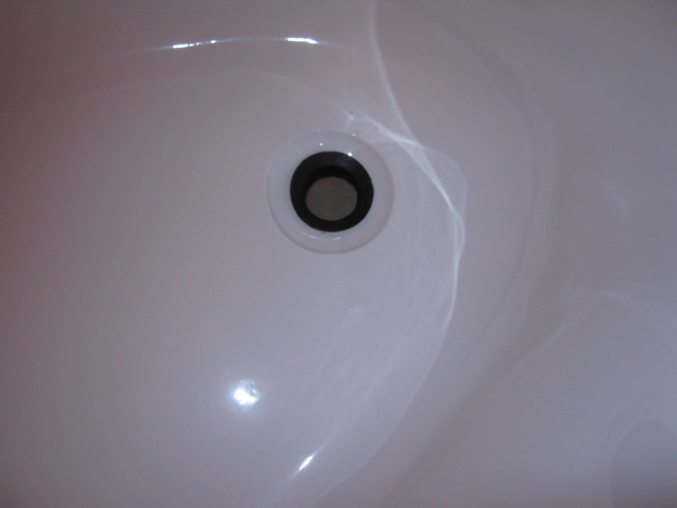 Bathtub drain hole.