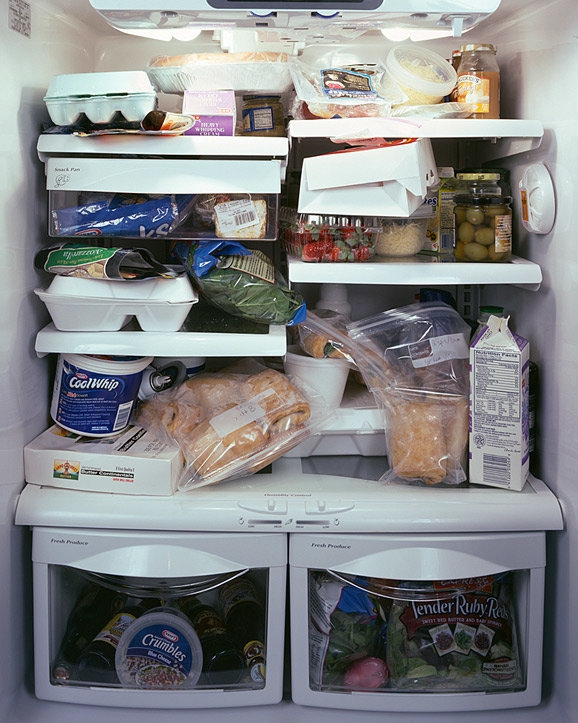 The refrigerator is full of food.