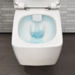 Wall hung rimless toilet.