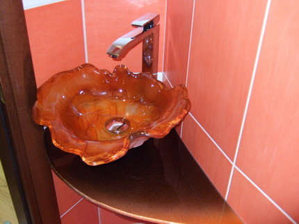 Glass washbasins.