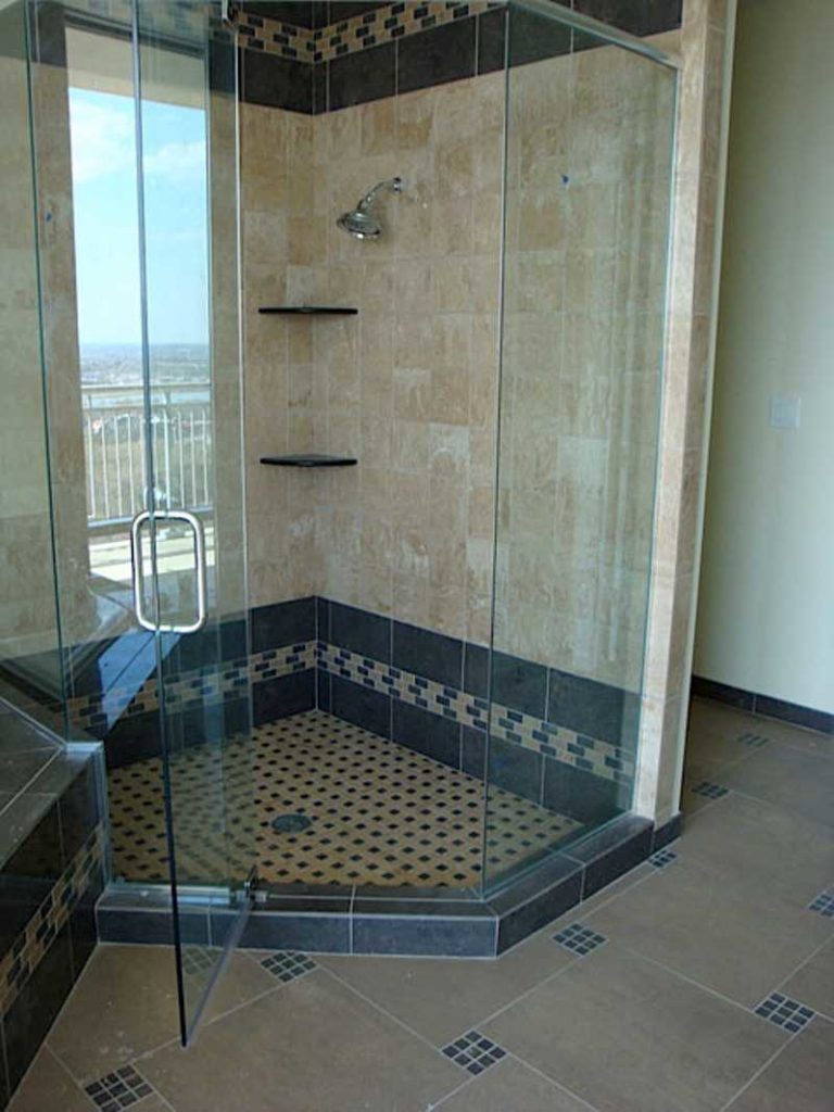 Asymmetrical shower enclosure.