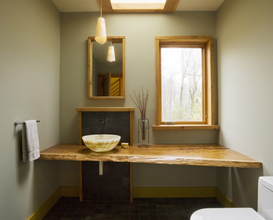 Wooden countertop under the sink.