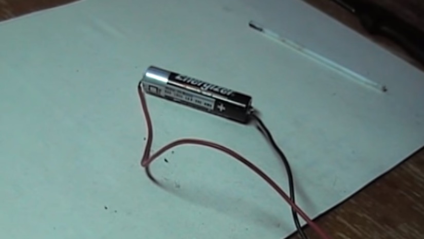 The wire is soldered to the battery.