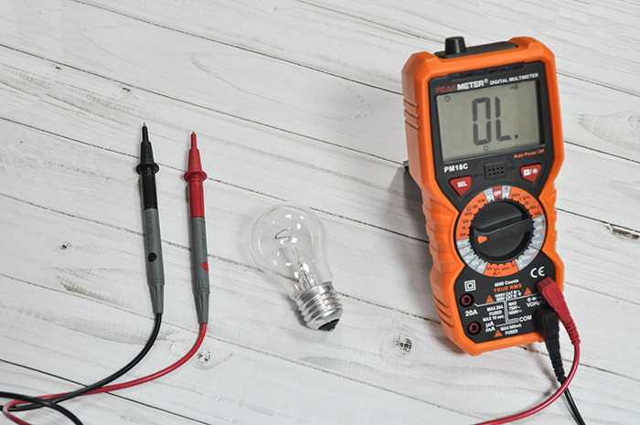 Light bulb and multimeter.