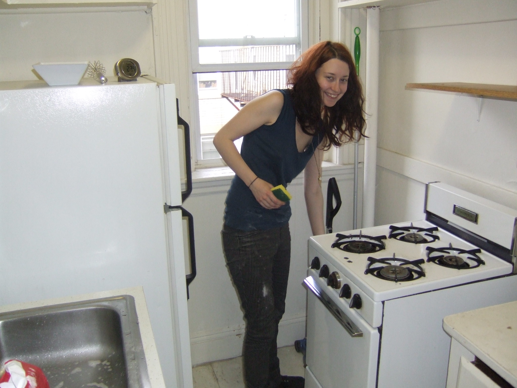 Cheerful girl cleaning