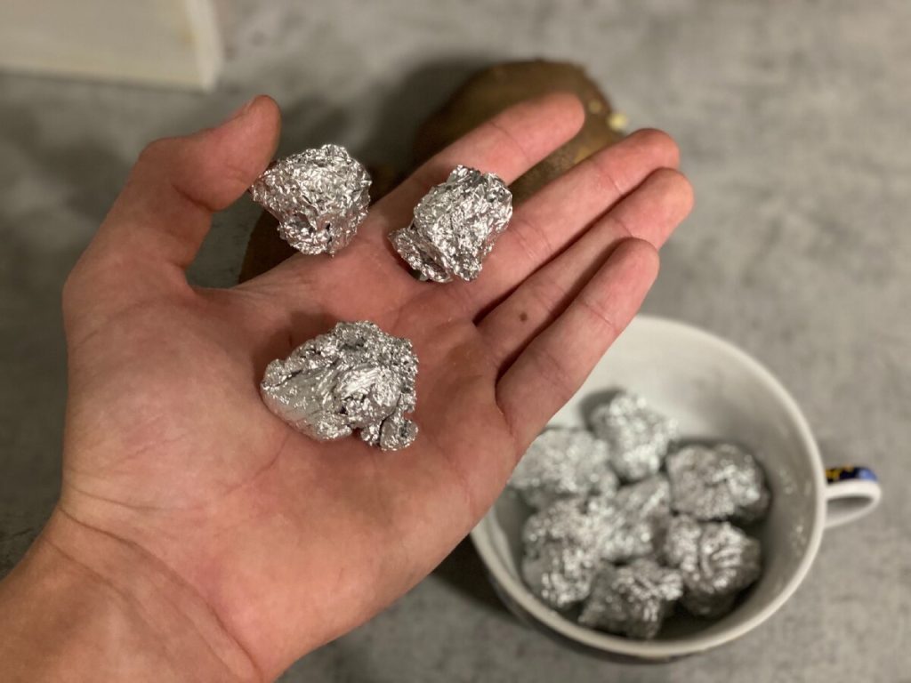 foil when planting potatoes