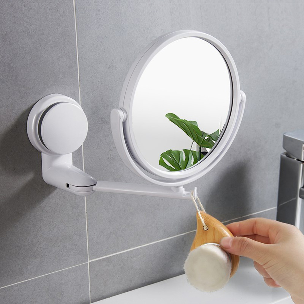 Cosmetic mirror with magnification