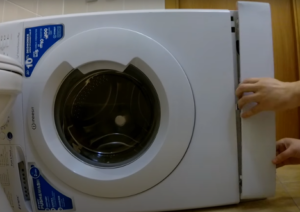 Hoe de pomp in een wasmachine Indesit te vervangen - 3