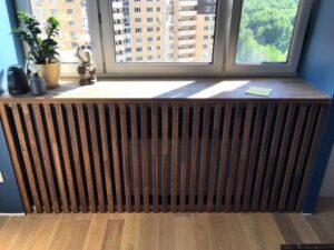 Comment fixer une calandre sur un radiateur