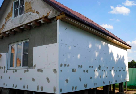 Isolation d'une maison en rondins de bois